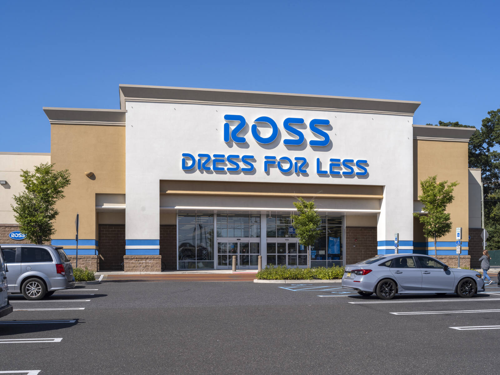 Ross Dress for Less storefront and grey cars in parking lot.
