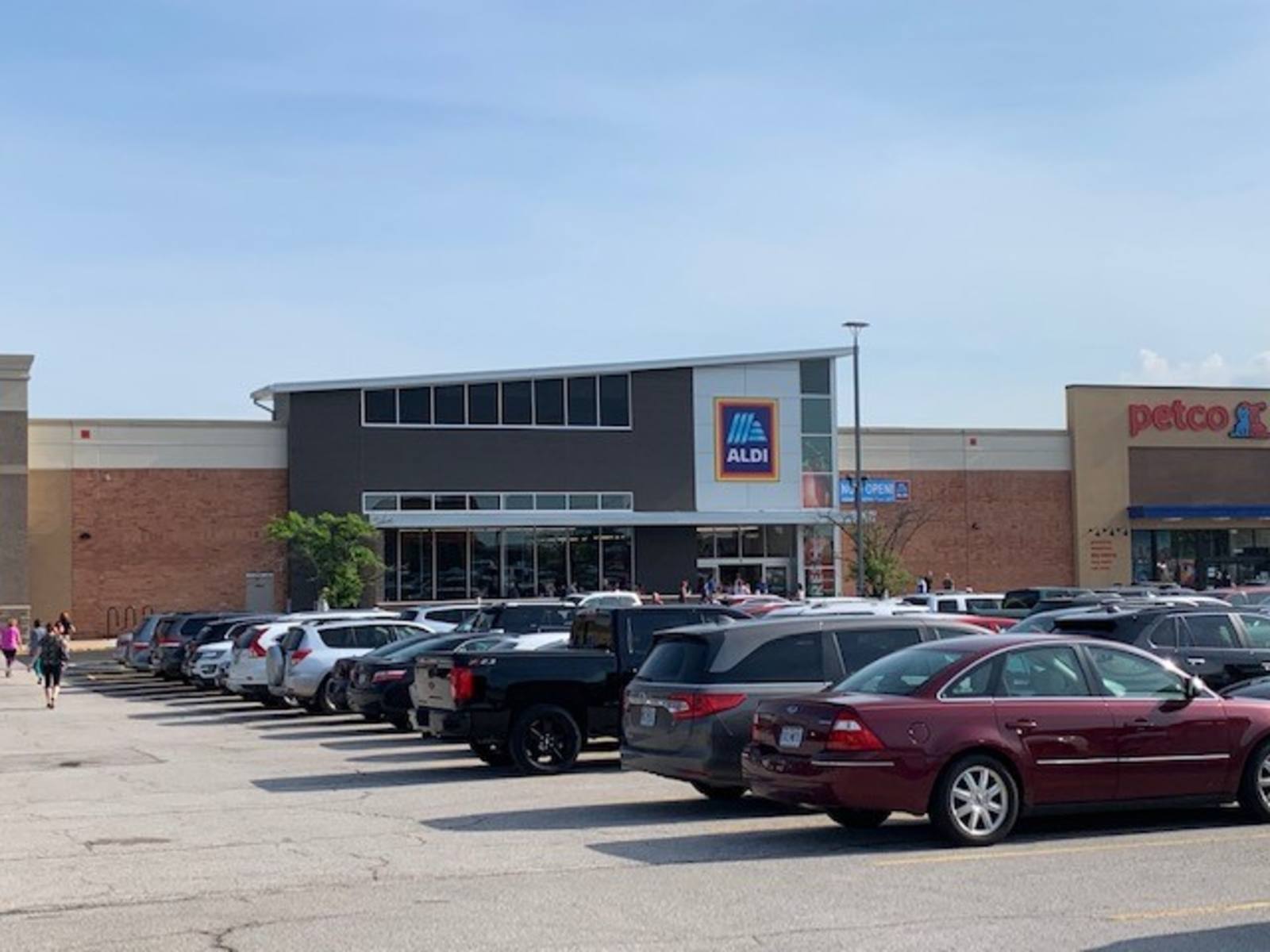 Busy parking lot at Aldi grocery store in Ellisville, MO.