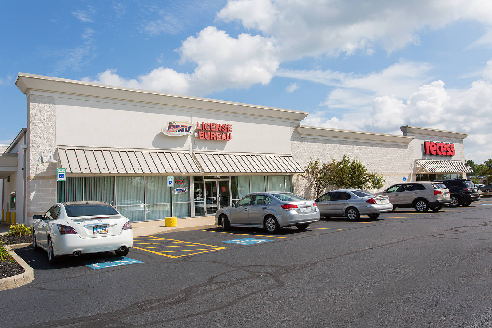 Cars lined along entrance of BMV License Bureau