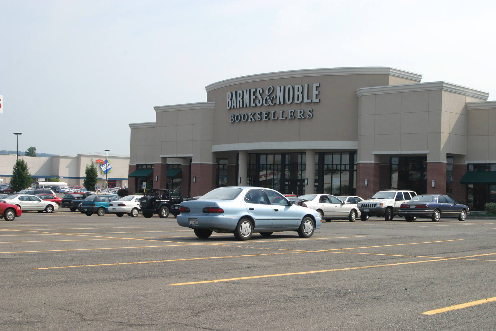 Cars parked in parking lot in front of Barnes & Noble
